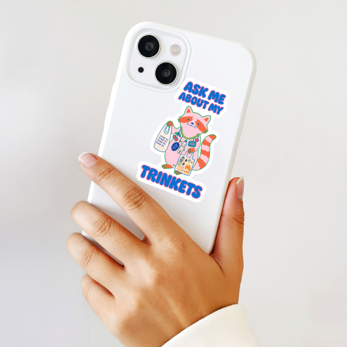 Ask Me About My Trinkets Sticker –Quirky Raccoon Collectible